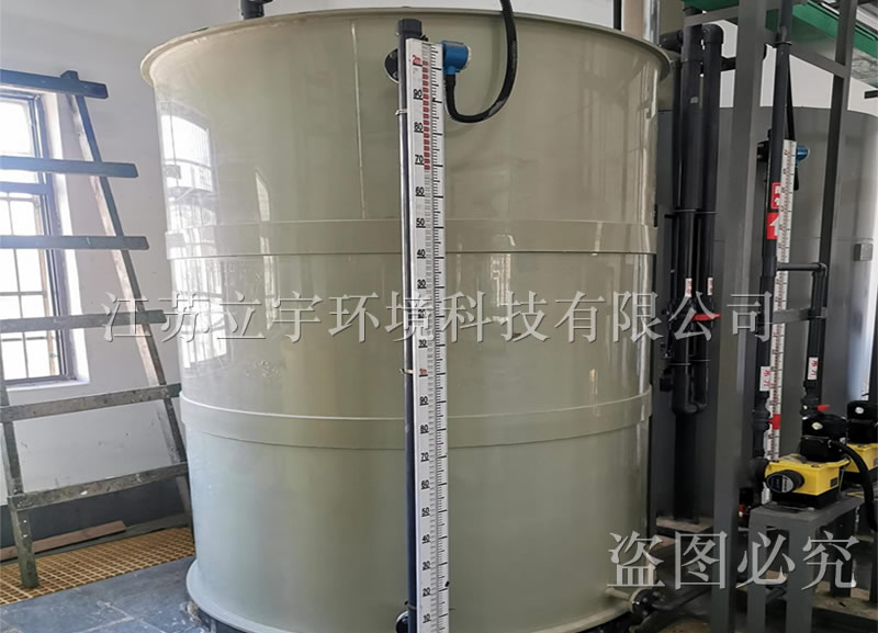 Treatment of wastewater containing heavy metal ions